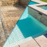 Before and after picture of construction of a swimming pool